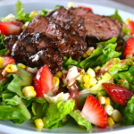 Steak Salad with Roasted Corn, Strawberries, and Blue Cheese