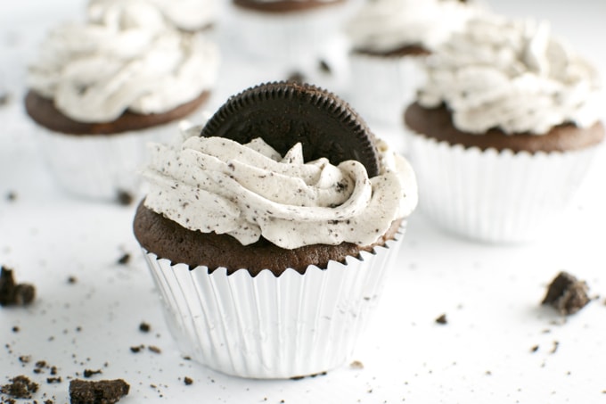 Decadent cookies and cream cupcakes with Oreo topping and cookies swirled frosting, perfect for sweet dessert lovers.