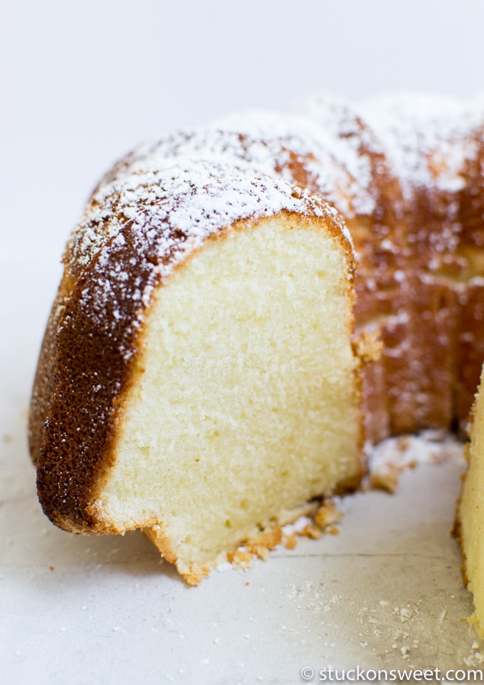 Fluffy vanilla pound cake with powdered sugar topping from Stuck On Sweet.