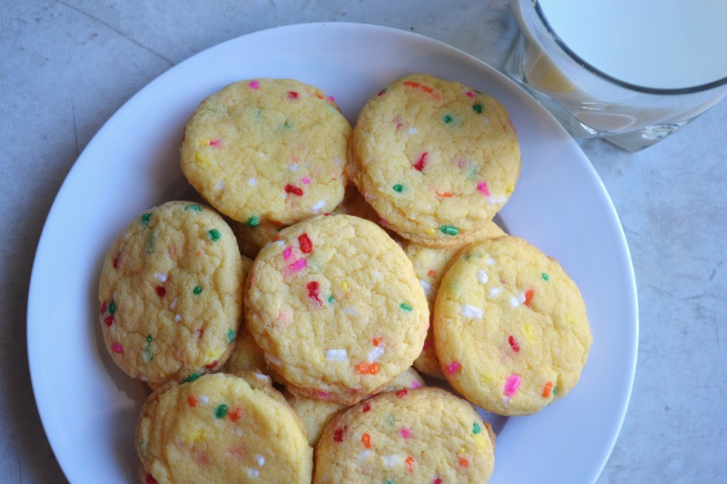 Sweet colorful sprinkles on classic sugar cookies for nostalgic homemade treats. Perfect for birthday parties, holidays, or everyday snacking. Delicious and visually appealing baked goods from Stuck On Sweet.