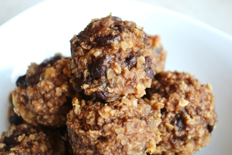 Chocolate oatmeal energy bites with dark chocolate chips, perfect for healthy snacking and sweet cravings. Made with wholesome ingredients, these bites are a delicious treat from Stuck On Sweet.