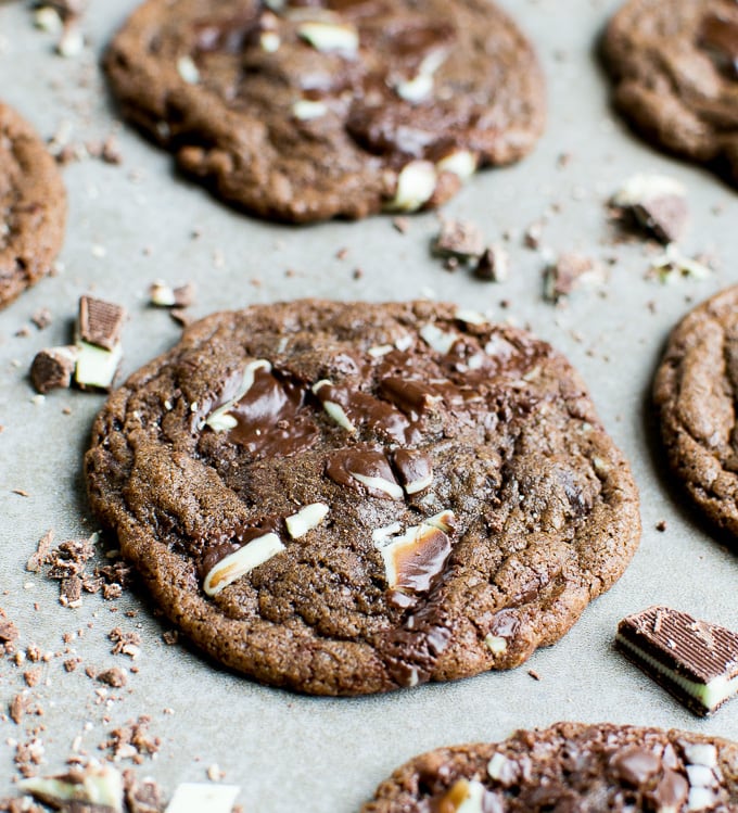 Delicious chocolate cookies with white chocolate chunks and drizzles, freshly baked and homemade, perfect sweet treat for cookie lovers.