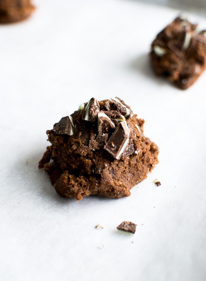 Decadent chocolate chip cookie dough truffle topped with chopped dark chocolate pieces, perfect for sweet tooth cravings and indulgent dessert treats.