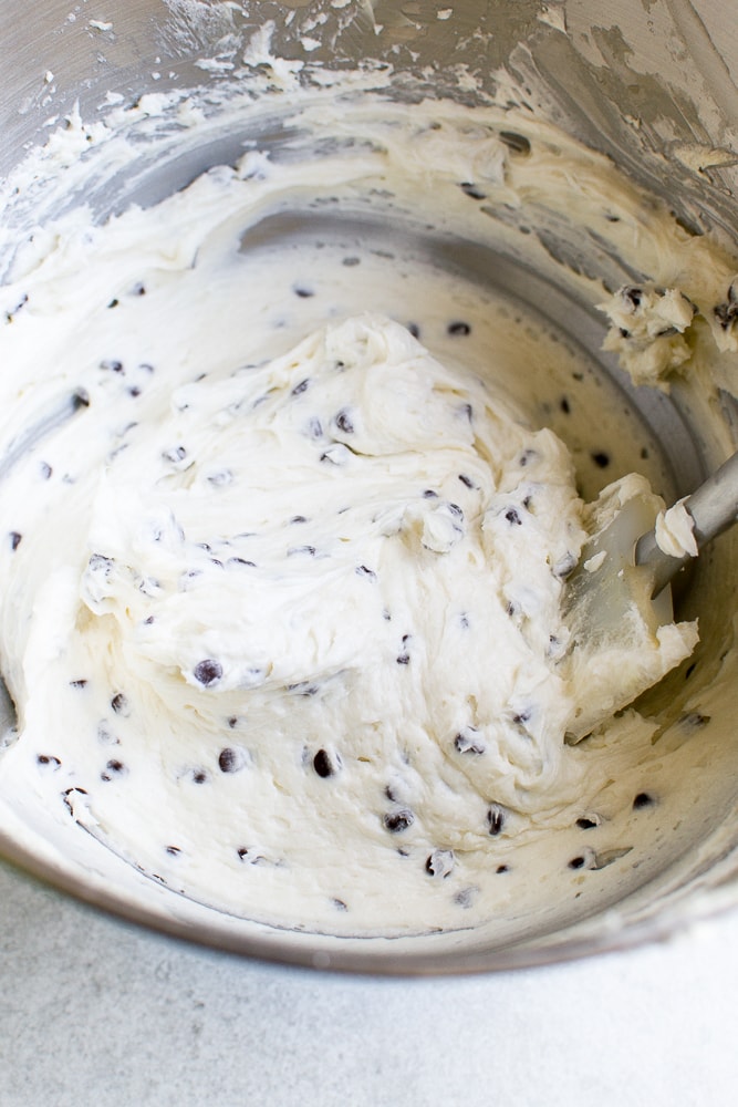 Cream cheese chocolate chip cookie dough for baking or snacking. Perfect for making homemade cookies, cookie dough bites, or ice cream toppings. Delicious and ready to bake or enjoy raw.
