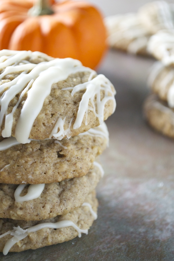 Soft pumpkin cookies drizzled with white icing, perfect for fall celebrations and pumpkin spice lovers. These easy pumpkin cookies are chewy, flavorful, and great for any autumn occasion.