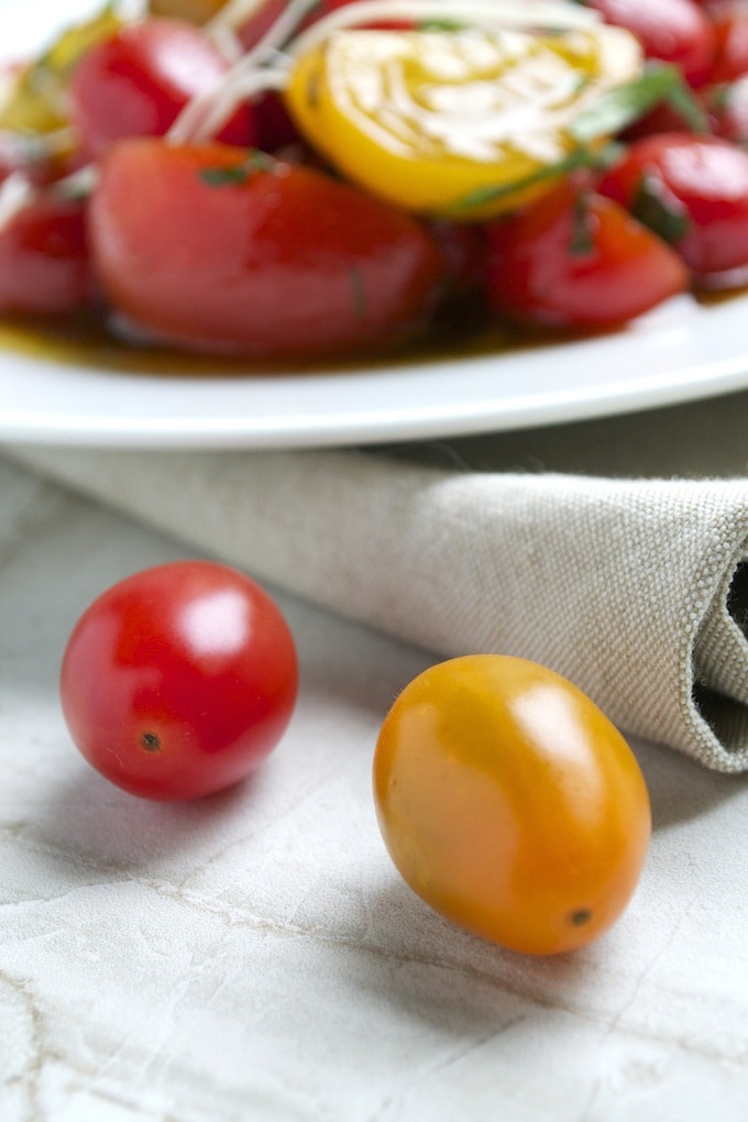 Fresh heirloom tomatoes with vibrant colors, ready for a delicious salad recipe.