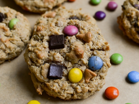 Soft-baked cookie with colorful candies and chocolate pieces, delicious treat from Stuck On Sweet.