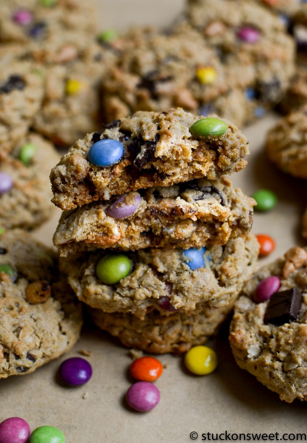 Chewy oatmeal cookies with colorful candy sprinkles and chocolate chunks, fresh out of the oven, perfect for sweet snacking or dessert.