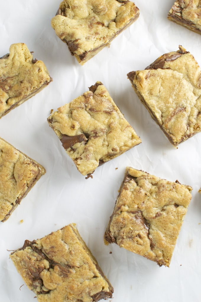 Butterscotch dessert bars with chocolate chunks, soft and chewy, perfect for snacking or dessert.