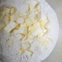 Flour and butter in mixing bowl for baking delicious desserts.