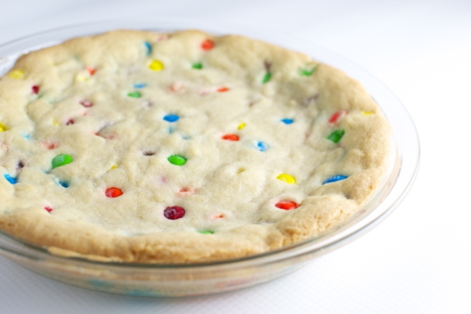 Colorful sprinkle cookie in a glass baking dish, perfect for sweet treats and dessert lovers.