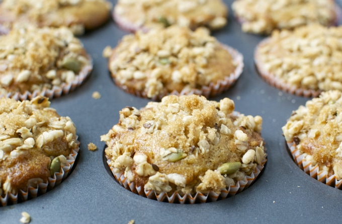 Butterscotch and nut crumble muffin, fresh baked sweet treat, easy dessert, crumbly topping, bakery display, delicious homemade muffin.