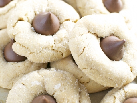 Butter cookies with chocolate centers, classic cookie recipes, soft sugar cookies, homemade cookie treats, sweet baked cookies for dessert.