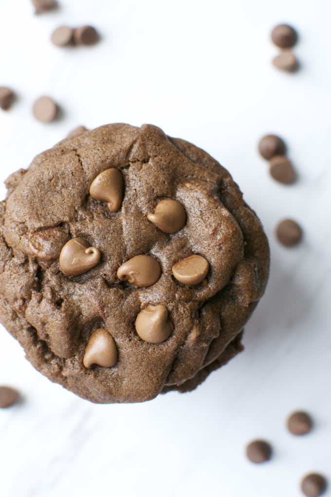 Decadent chocolate chip cookie with melted chocolate chips on a white background. Perfect for satisfying sweet cravings and homemade dessert ideas.