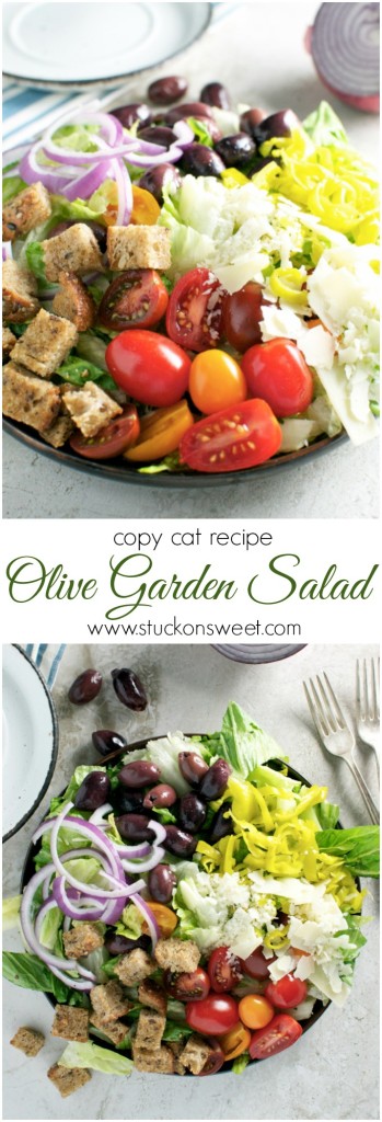Fresh olive garden salad with cherry tomatoes, red onions, shredded cheese, croutons, and mixed greens, perfect for healthy eating and family meals.