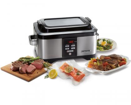 Stainless steel multi-functional pressure cooker with digital control display and safety features.