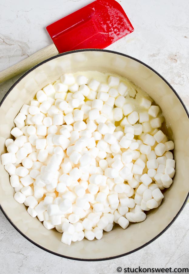 Mini marshmallows melting in a pot, perfect for hot chocolate or dessert recipes. Soft, sweet, and melt-in-your-mouth texture, ideal for cozy treats and baking needs.