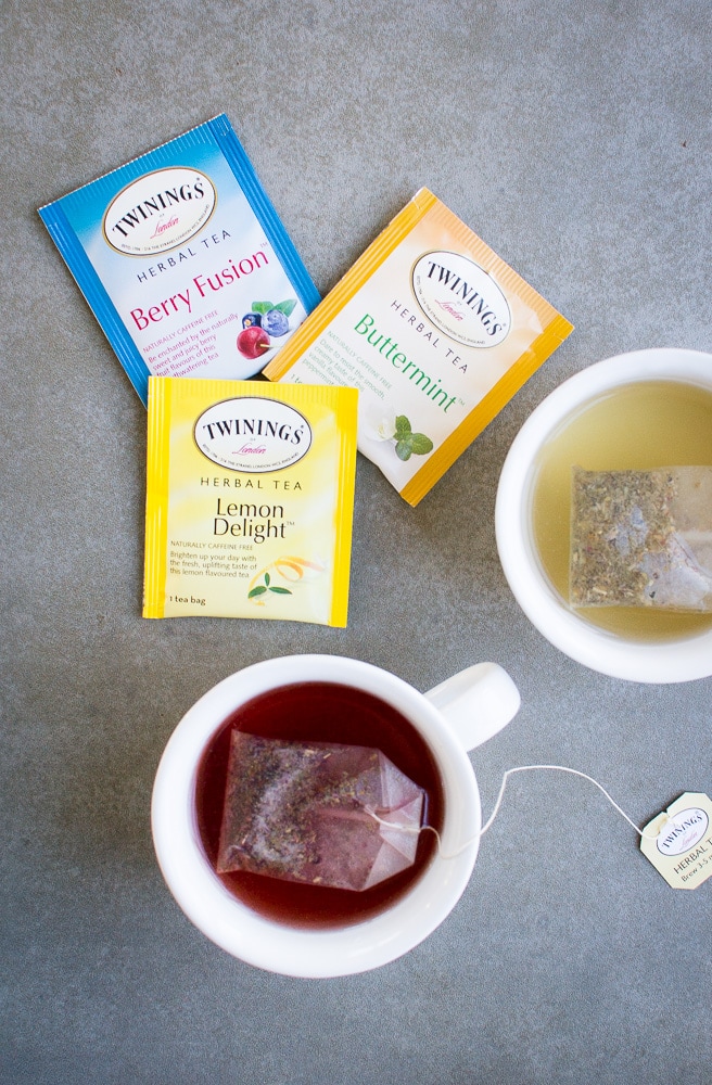 Rich herbal tea bags including berry fusion, buttermint, and lemon delight from Twinings Herbal Tea collection. Perfect for a soothing, natural beverage experience.