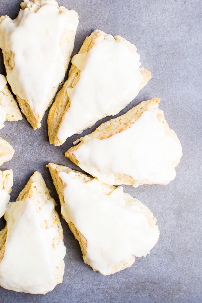 Cream cheese frosting on lemon sugar cookies - perfect sweet treat.
