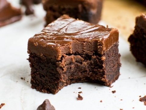 Decadent homemade chocolate brownies with a rich, gooey center and smooth frosting, perfect for satisfying sweet cravings. Gluten-free and made with high-quality cocoa for ultimate flavor.