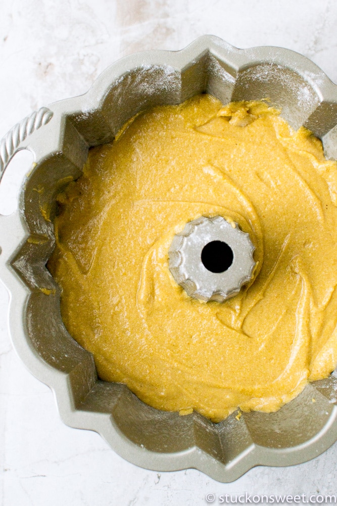 spiced pumpkin bundt cake batter in a bundt pan