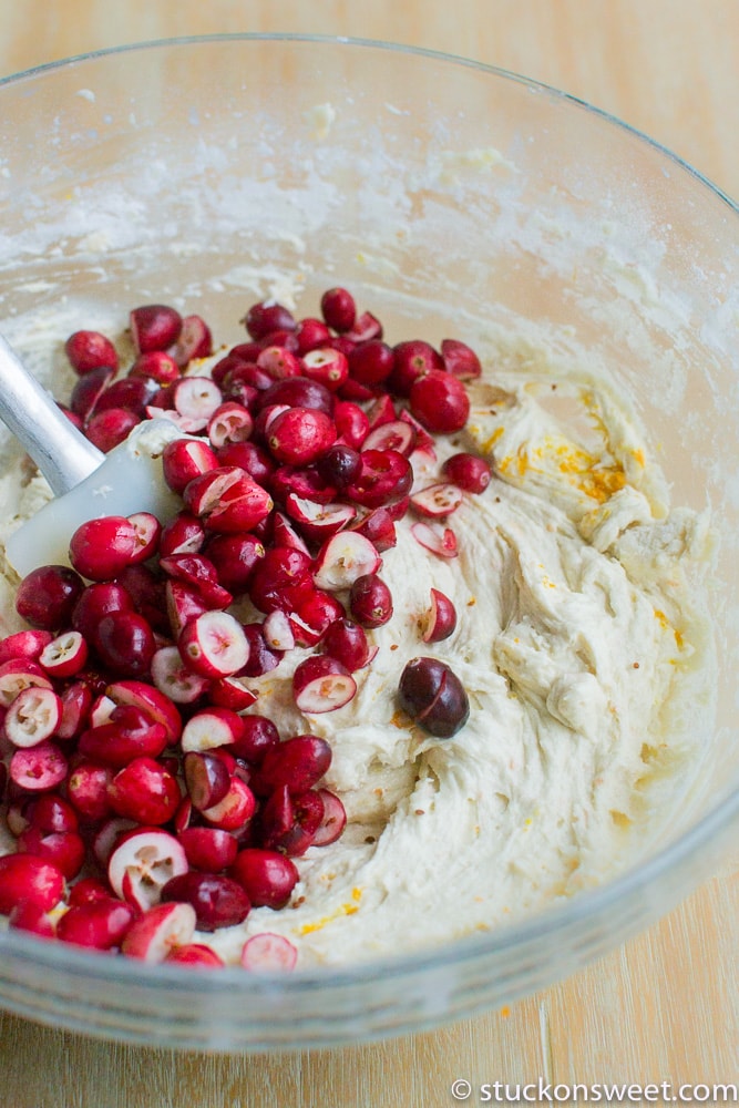 Fresh cranberries added to creamy batter for baking.
