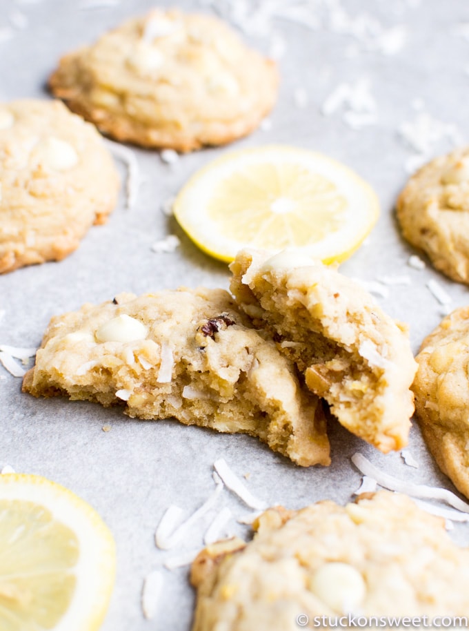 Buttery, lemon-infused cookie with white chocolate chips and almonds, perfect for lemon lovers and cookie enthusiasts.