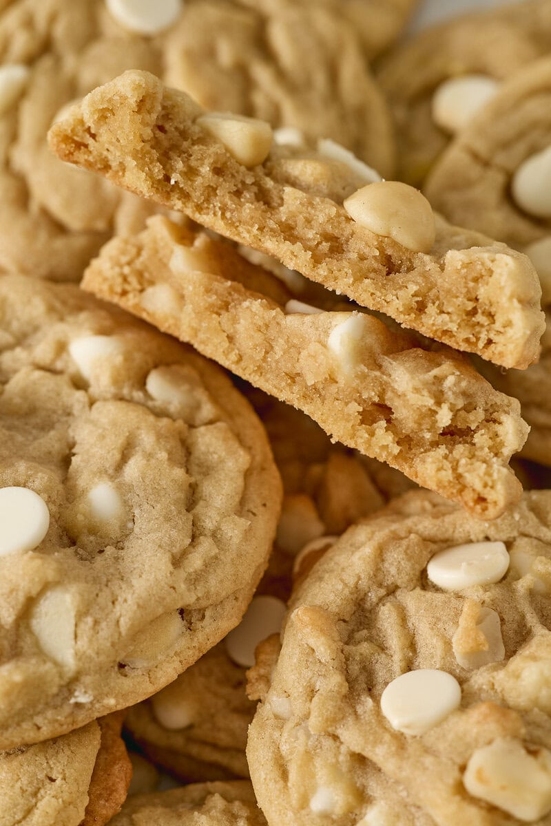 Buttery white chocolate chip cookies with a chewy center and crispy edges, perfect for snack or dessert. Freshly baked cookies from Stuck On Sweet.