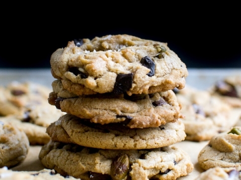 Buttery chocolate chip cookies with chunky chocolate pieces and a soft, chewy texture, perfect for snacking or sharing.