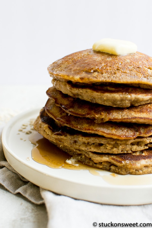 Fluffy homemade pancakes topped with butter and drizzled with syrup, perfect for breakfast or brunch. A delicious stack made with wholesome ingredients, ideal for pancake lovers.
