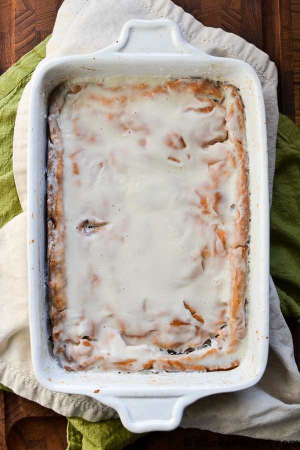 Creamy lasagna casserole topped with béchamel sauce, served in a white baking dish; delicious Italian comfort food perfect for family dinners.