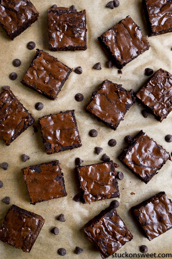 Decadent chocolate brownies with a glossy, fudgy top and rich, moist interior, perfect for dessert or sweet snack cravings.