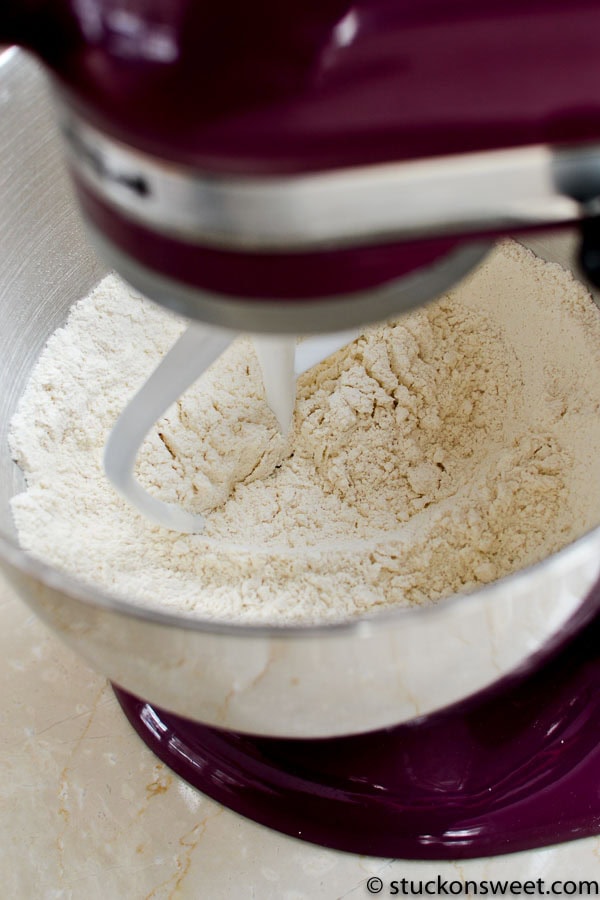 Flour in stand mixer for baking recipes, close-up.