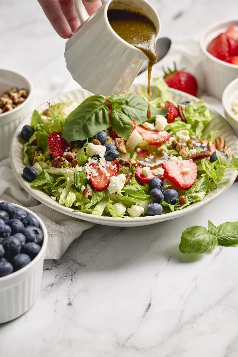 Balsamic Basil Vinaigrette poured over a salad