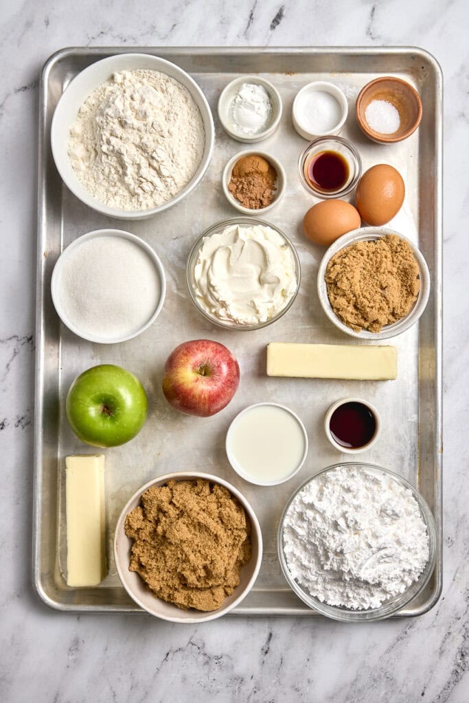 Butter, sugar, eggs, flour, vanilla extract, baking powder, salt, brown sugar, cream cheese, apples, apple, green apple, salted butter, powdered sugar, brown sugar, maple syrup, vanilla extract, creamy frosting, baking ingredients, dessert baking, Stuck On Sweet, apple crumb dessert, baking supplies.