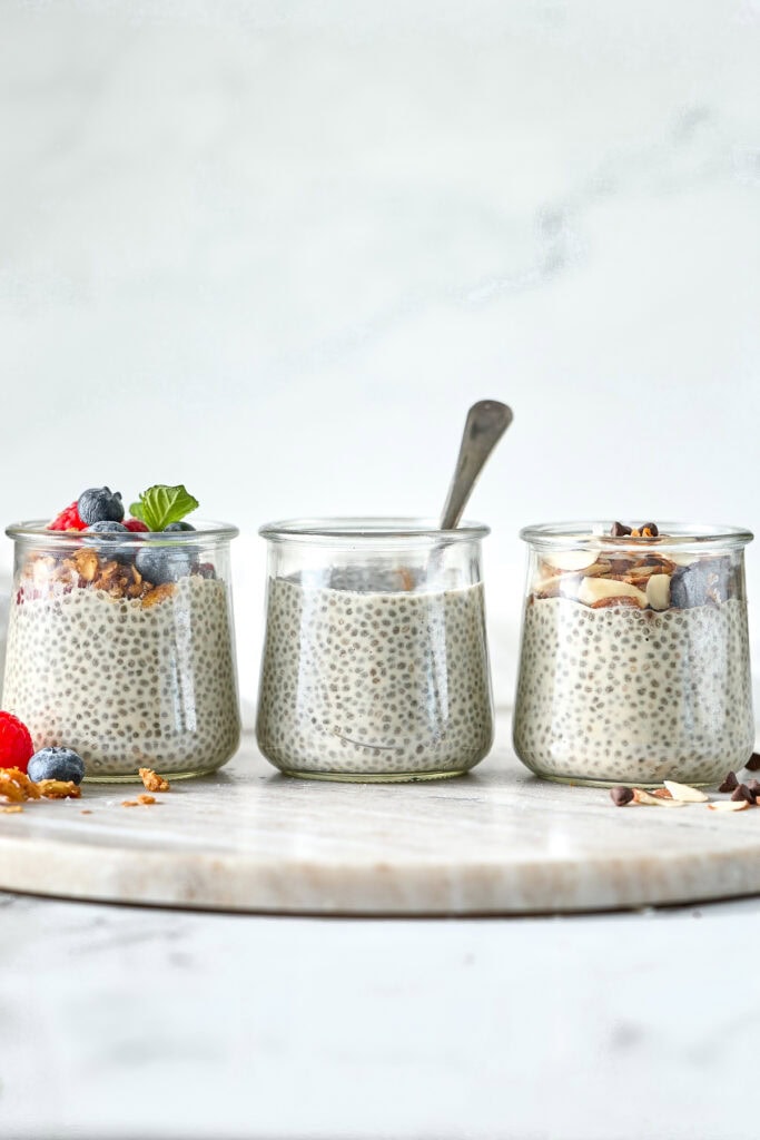 Creamy chia pudding with fresh berries and toppings for healthy dessert recipes.