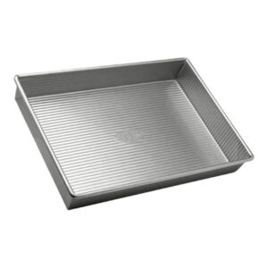 Aluminum baking sheet for baking and roasting, non-stick, durable, professional-grade kitchenware.