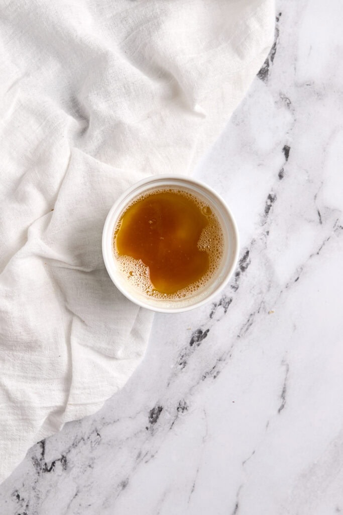 brown butter in a white dish