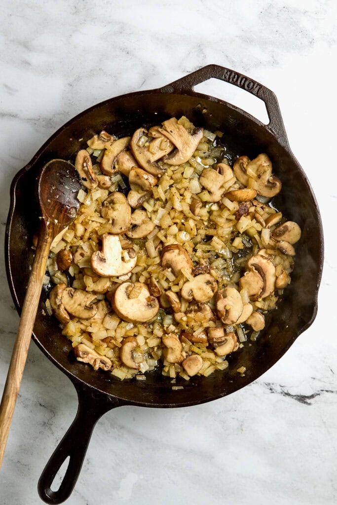 Sautéed mushrooms and onions in cast iron skillet, home-cooked recipe, delicious vegetable side dish, healthy cooking, Stuck On Sweet.
