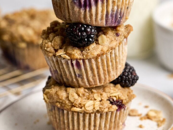 Delicious homemade blackberry oatmeal muffins topped with oats and fresh berries, perfect for breakfast or snack. Enjoy moist, flavorful muffins with crunchy topping, ideal for satisfying sweet cravings.