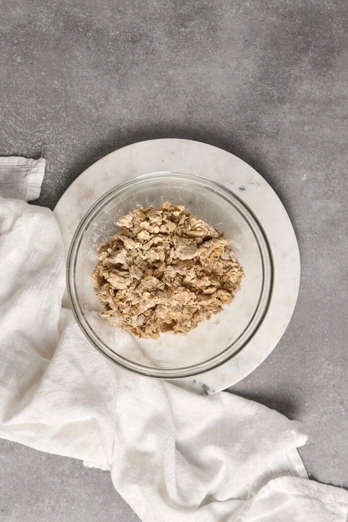 Delicious homemade cookie dough in a glass bowl for baking or snacking. Perfect for cookie lovers, featuring fresh ingredients and a classic flavor. Ideal for cookie dough recipes and baking treats.