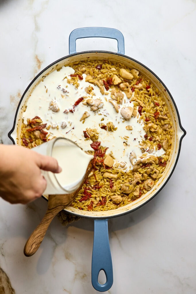 Delicious one-pan chicken and rice dish with creamy sauce, fresh taste, and comforting flavor. Perfect for family dinners or meal prep. Easy to make with simple ingredients.