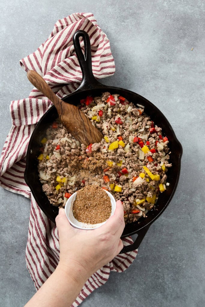 Delicious ground beef with colorful bell peppers in a skillet, perfect for easy weeknight dinners or meal prep, highlighting savory comfort food and simple cooking.