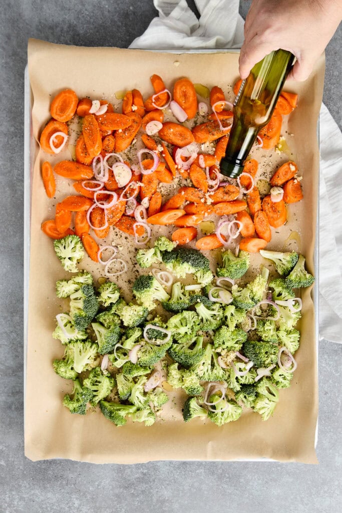 Roasted broccoli and carrots seasoned with garlic, Parmesan cheese, and lemon zest, perfect for a healthy side dish. Easy to prepare and full of flavor, ideal for a nutritious meal.