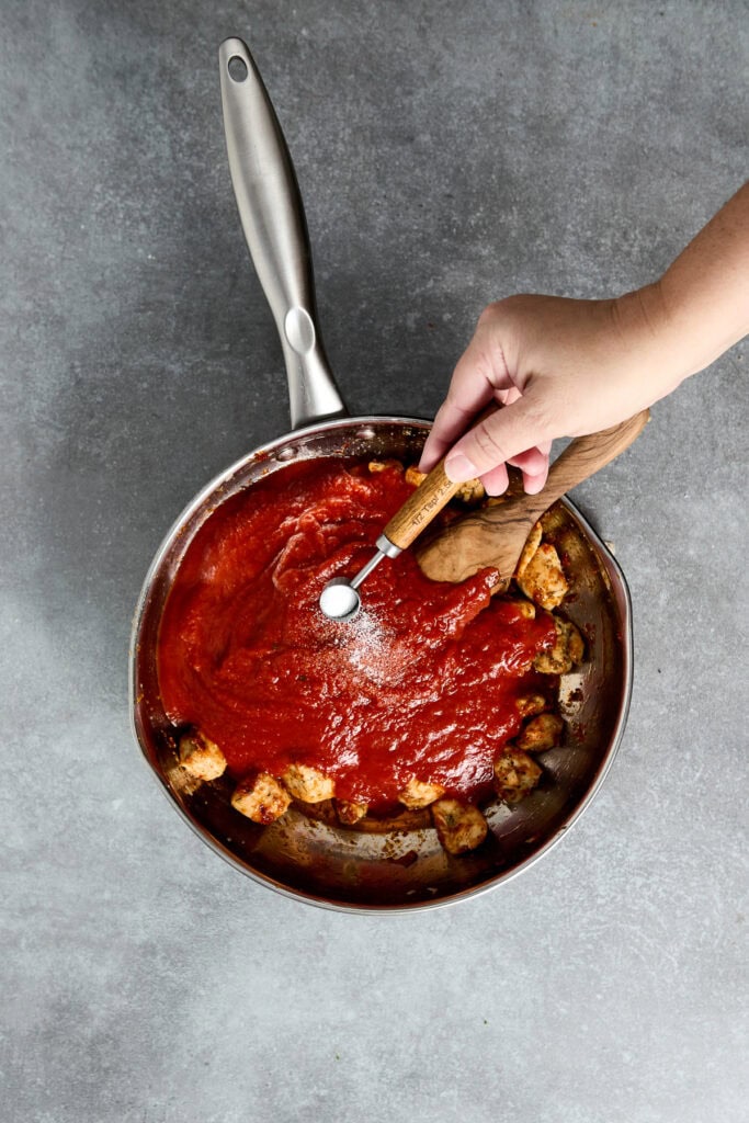 Chicken Parmesan skillet with breaded chicken pieces topped with rich marinara sauce, ready to serve. Perfect for a quick, flavorful Italian dinner.