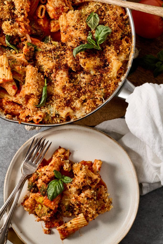 Delicious homemade Chicken Parmesan skillet with breaded chicken, marinara sauce, melted cheese, and fresh basil, perfect for a quick and flavorful Italian meal.