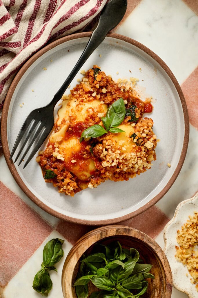 Easy 30 minute ground beef and spinach ravioli on a white plate. 