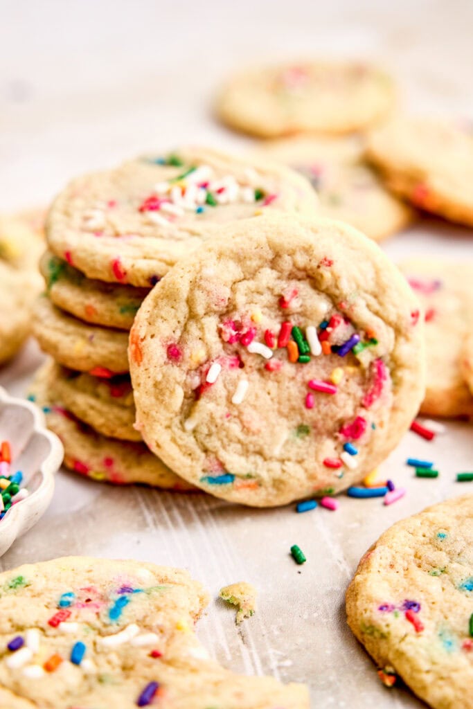 Close-up of freshly baked funfetti cookies decorated with colorful sprinkles, perfect for celebrations and holidays.